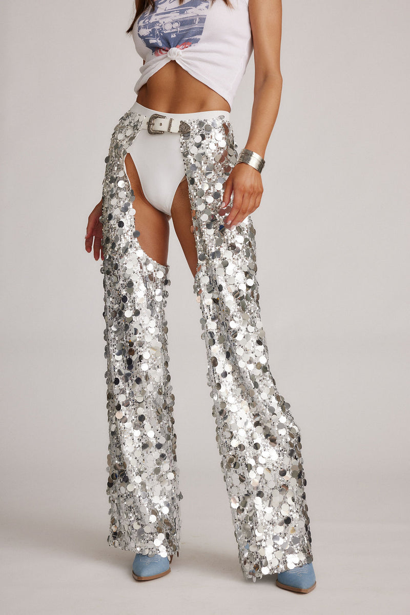 Silver pants with elegant accents, a silver chaps standout.