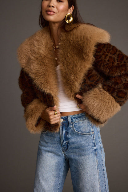 Full-length view of the leopard print jacket showing the drape and movement.