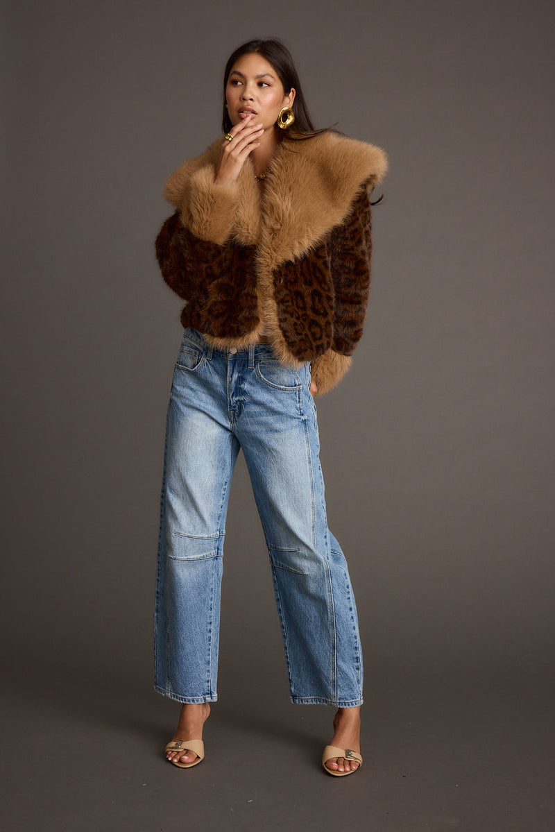 Wild Heart Leopard Faux Fur Cropped Jacket paired with complementary accessories for a polished look.