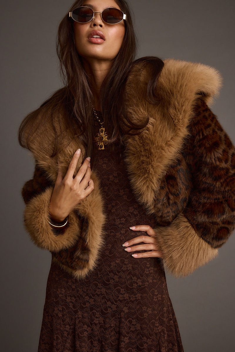 Detail shot of the Wild Heart Leopard Faux Fur Cropped Jacket highlighting the cropped elements.
