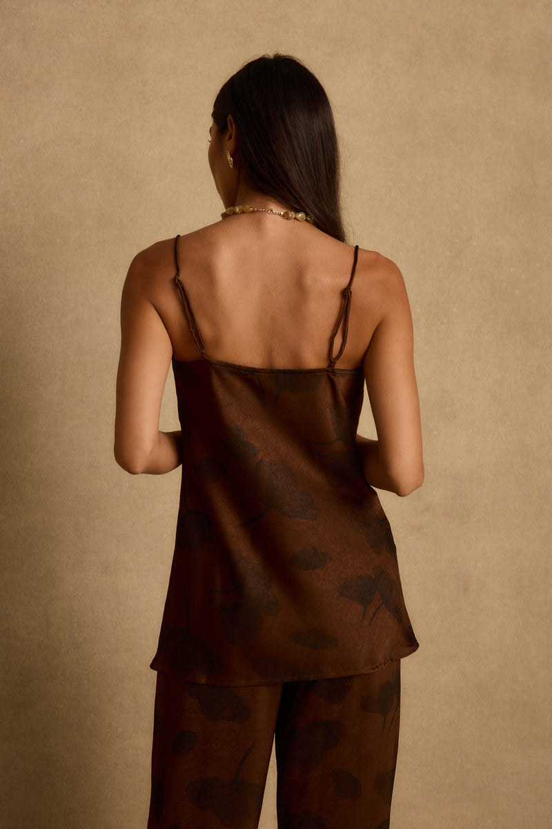 Back view of espresso brown floral satin cami tank with thin adjustable straps.
